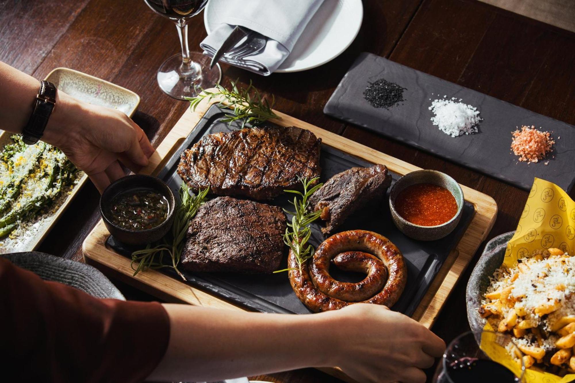 Voco Orchard Singapore By Ihg Luaran gambar A selection of meat at the restaurant